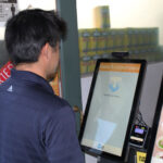 Customer paying using his face